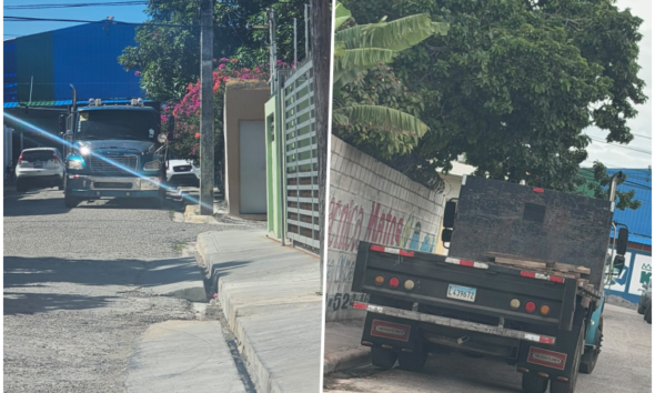 Camiones estacionados en una vía del sector Naco, en Barahona, que residentes señalan como un obstáculo para el tránsito.