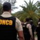 Caso judicial en Florida contra dos miembros de la Dirección Nacional de Control de Drogas acusados de delitos relacionados con cocaína.